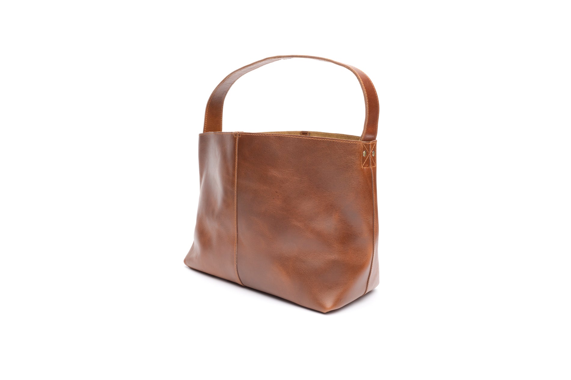Angle view of Stylish fashionable brown leather tote that is fair trade ethically produced