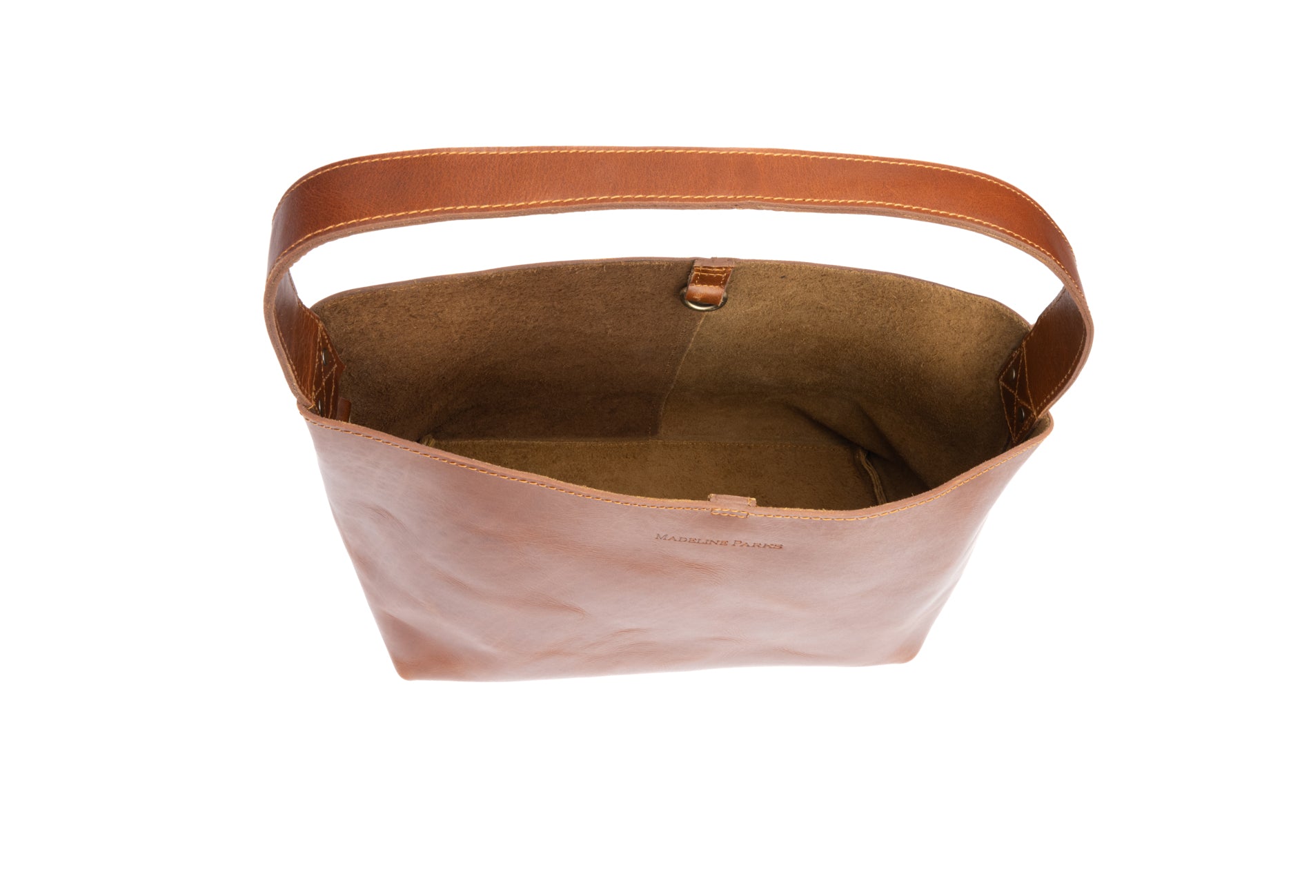 Stylish fashionable brown leather bucket bag that is fair trade ethically produced