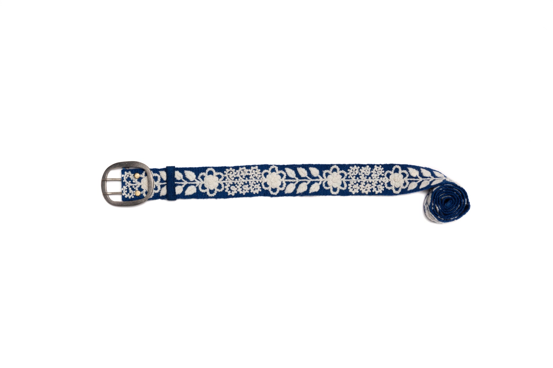 Tess Hand Embroidered Belt, a classic navy wool fabric with cream floral and leaves