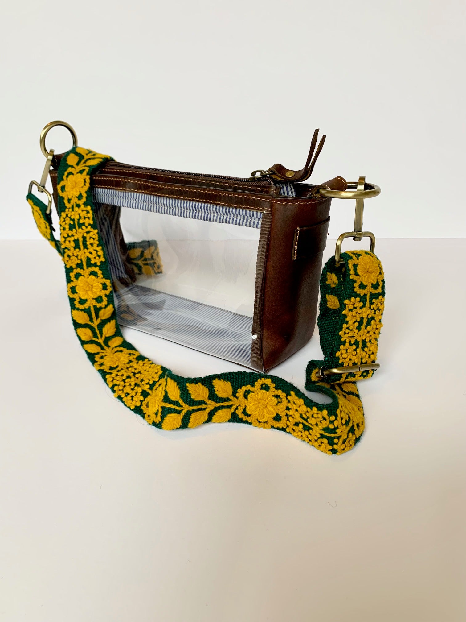 Alison Adjustable Purse Strap: A hand-embroidered green fabric strap with gold floral and leaves design