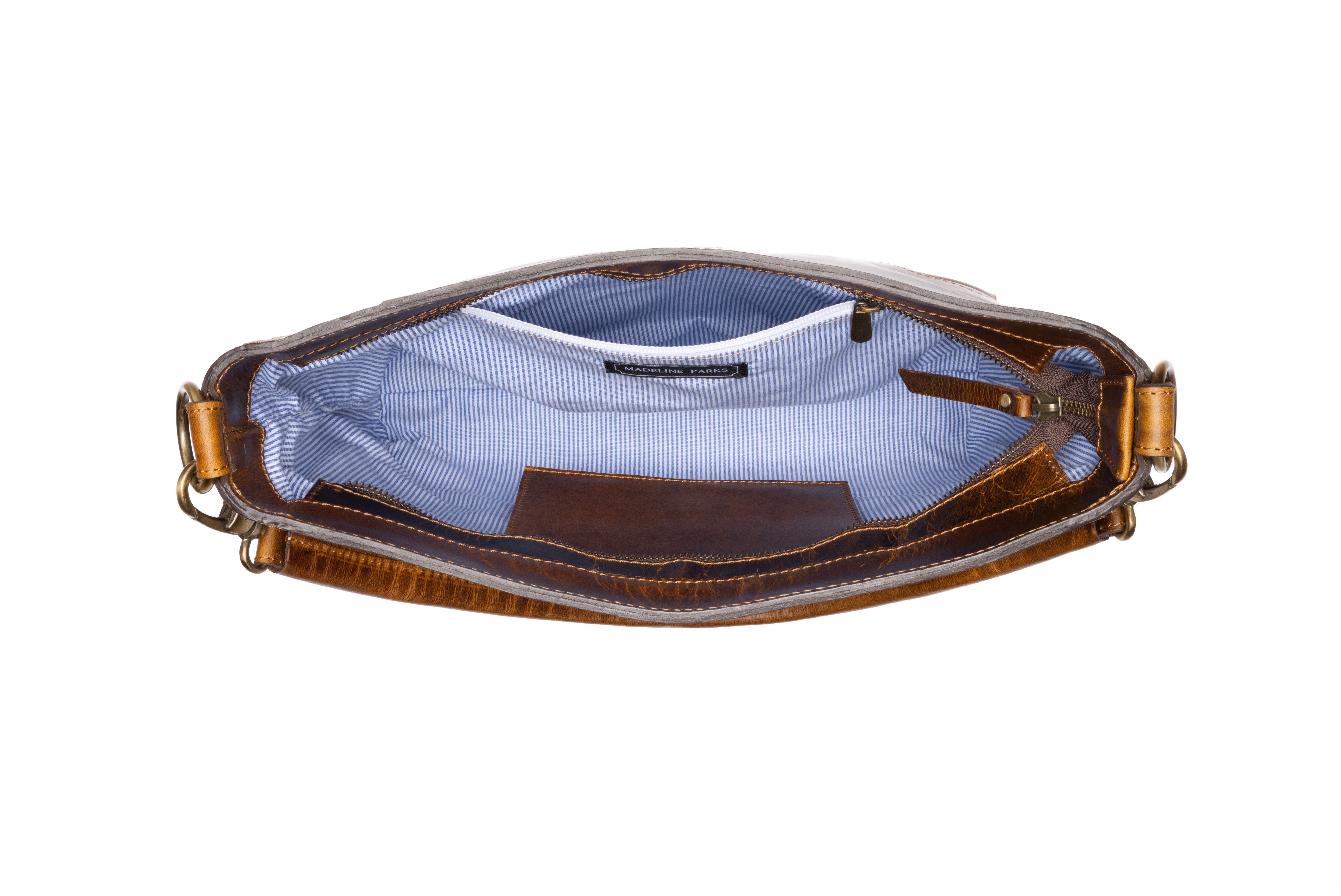 Catherine Leather Purse top view showing the blue and white striped fabric lining .