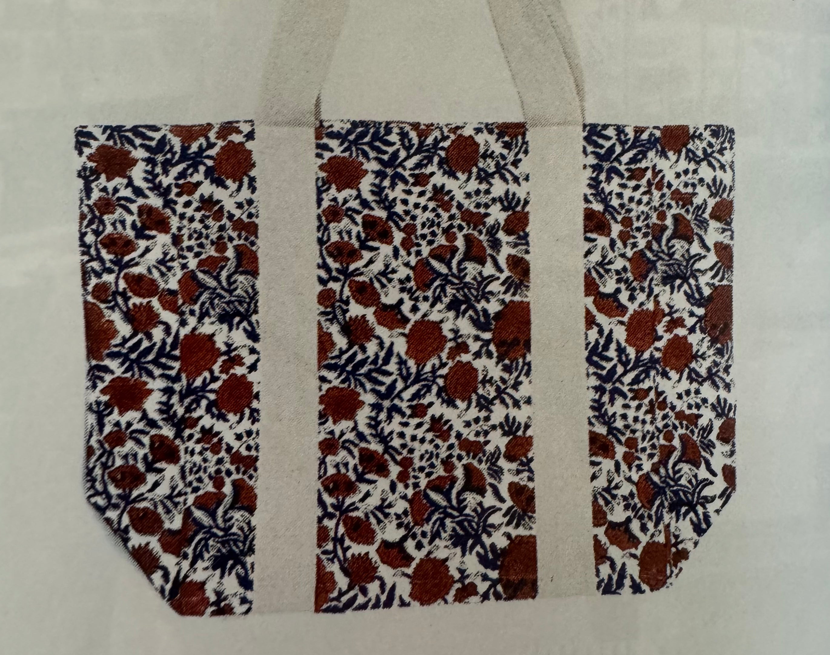 Block Printed Canvas Bag with a floral pattern, hand-printed on 100% cotton, measuring 18 x 15 x 7.