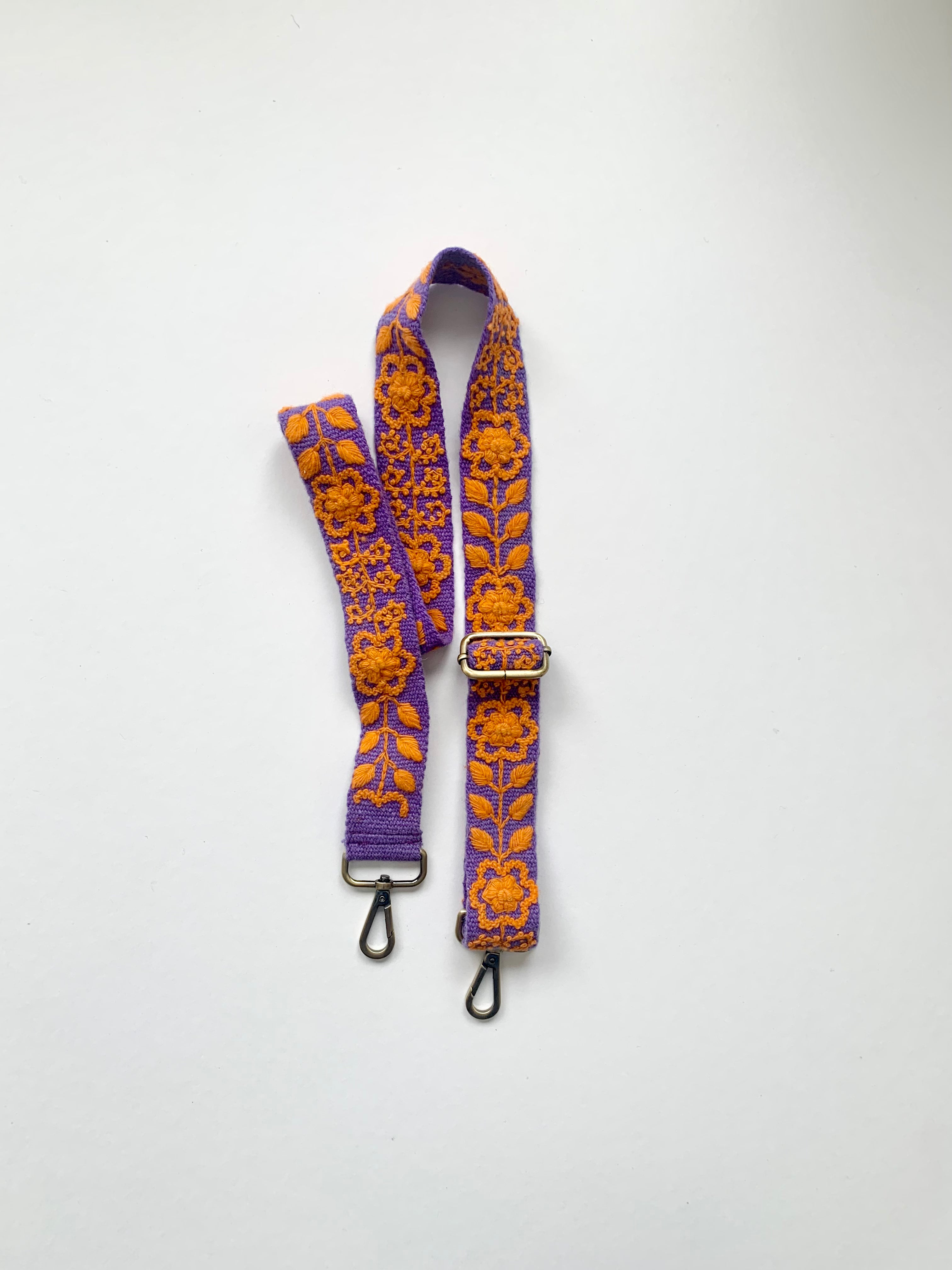 Katy Adjustable Purse Strap - A stylish fashion accessory featuring a purple and orange floral design