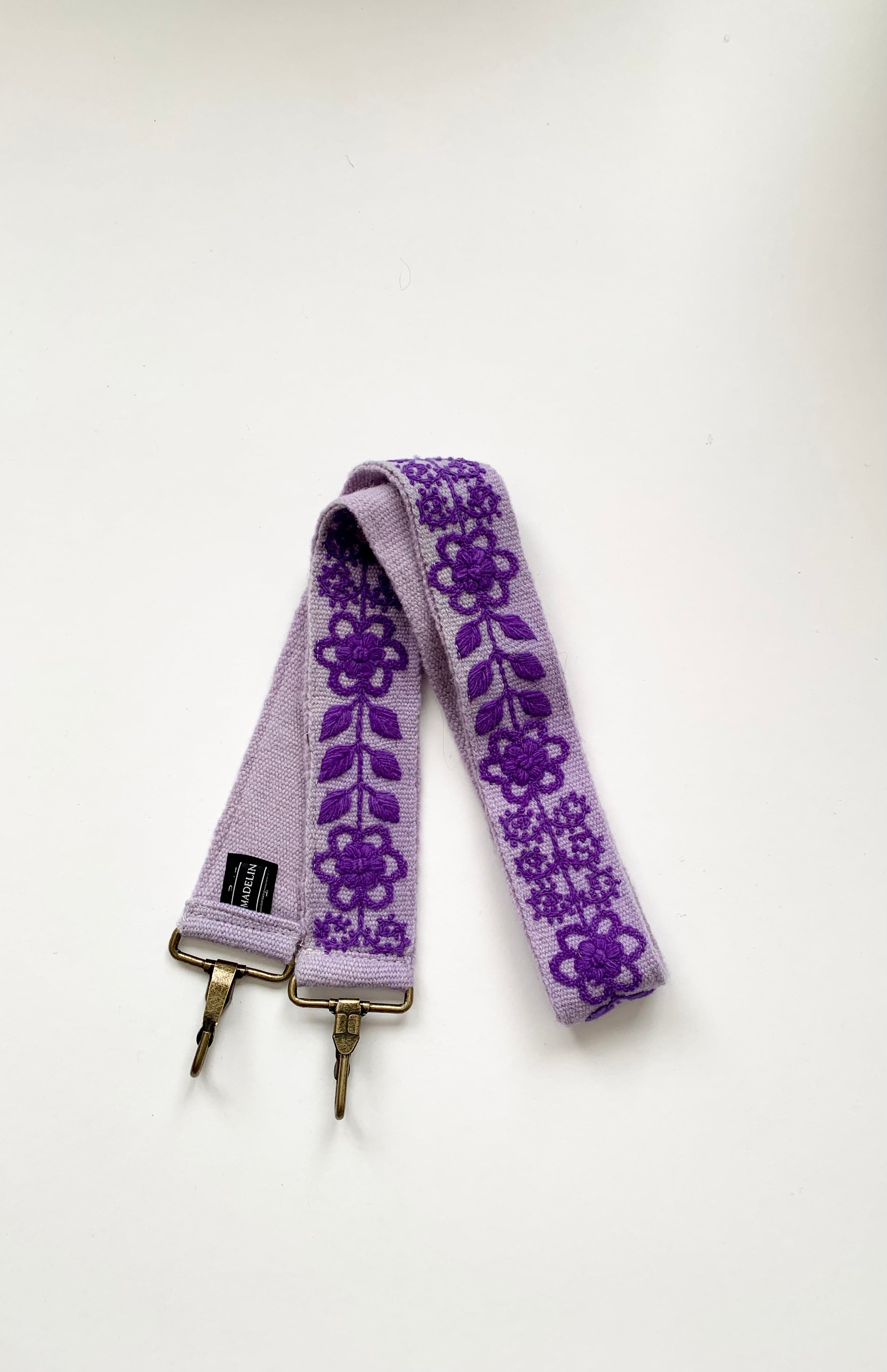 Eliza Large Purse Strap with intricate floral and leaf design, hand loomed in lavender wool. 