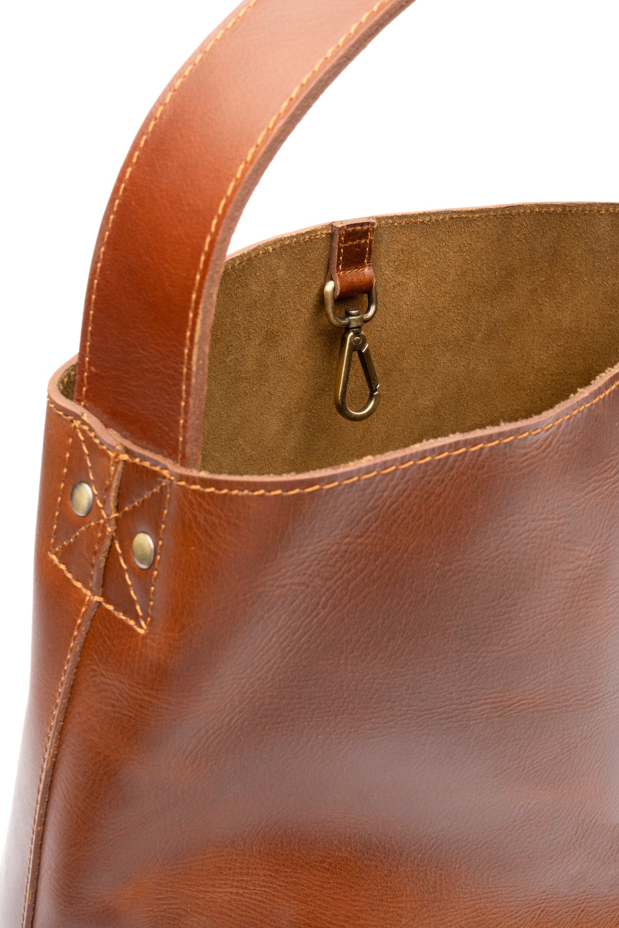 Close up view d-ring interior of Stylish fashionable brown leather tote that is fair trade ethically produced