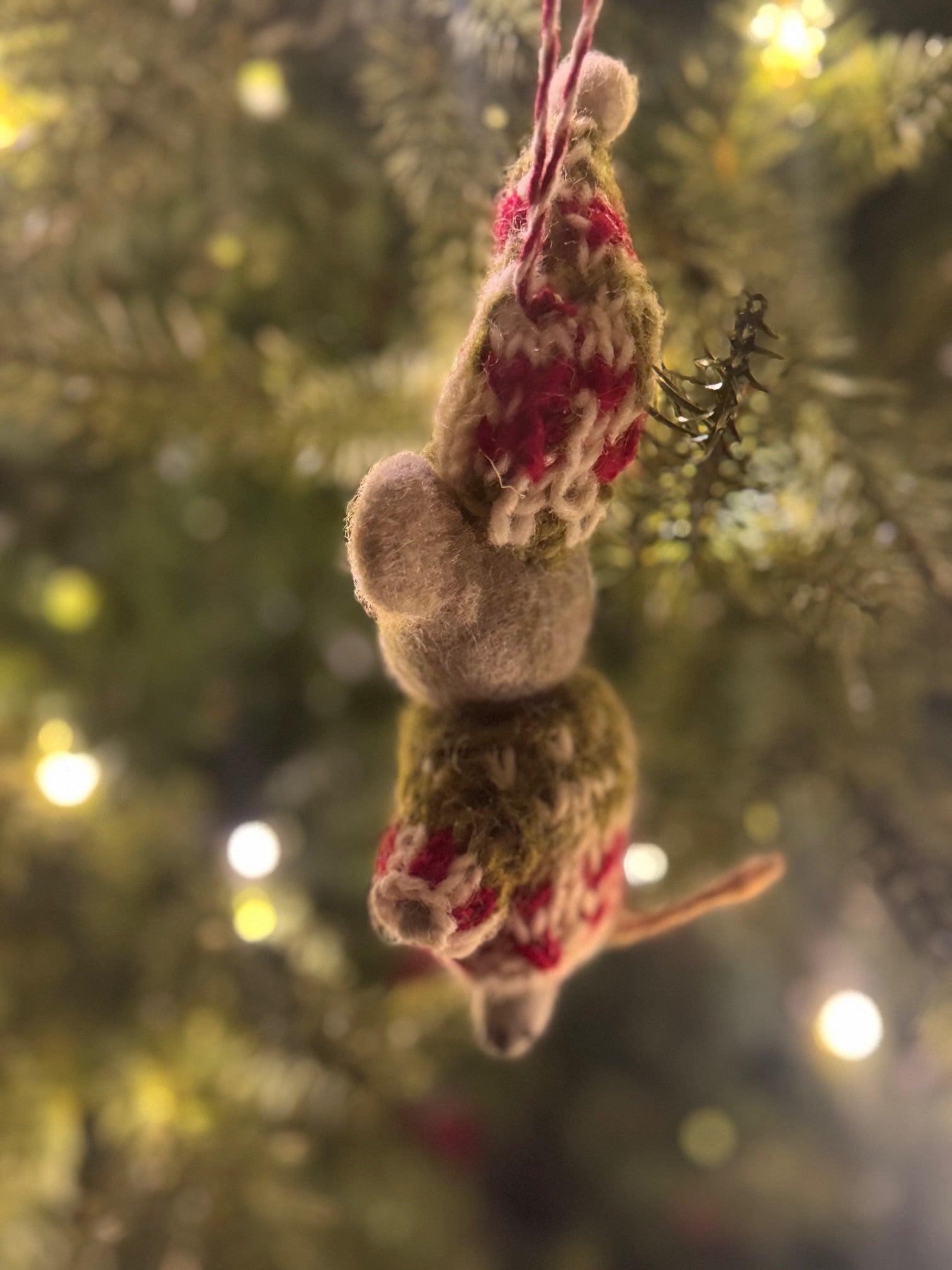 Mouse Ornament nestled on a tree, capturing a festive touch, embodying Madeline Parks' commitment to handcrafted artistry and unique holiday decor.