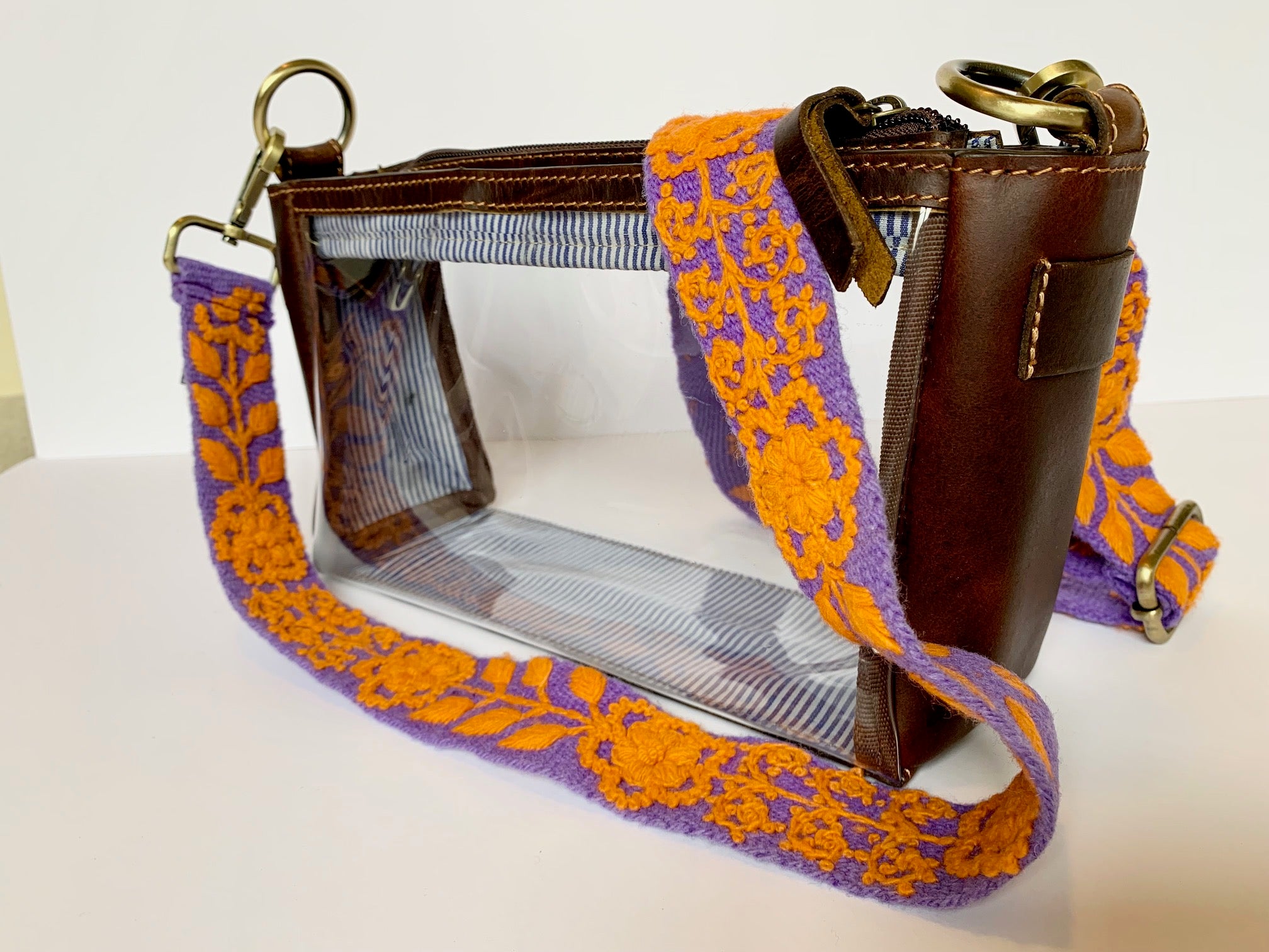 Katy Adjustable Purse Strap purple and orange shown with Claire Clear Purse.