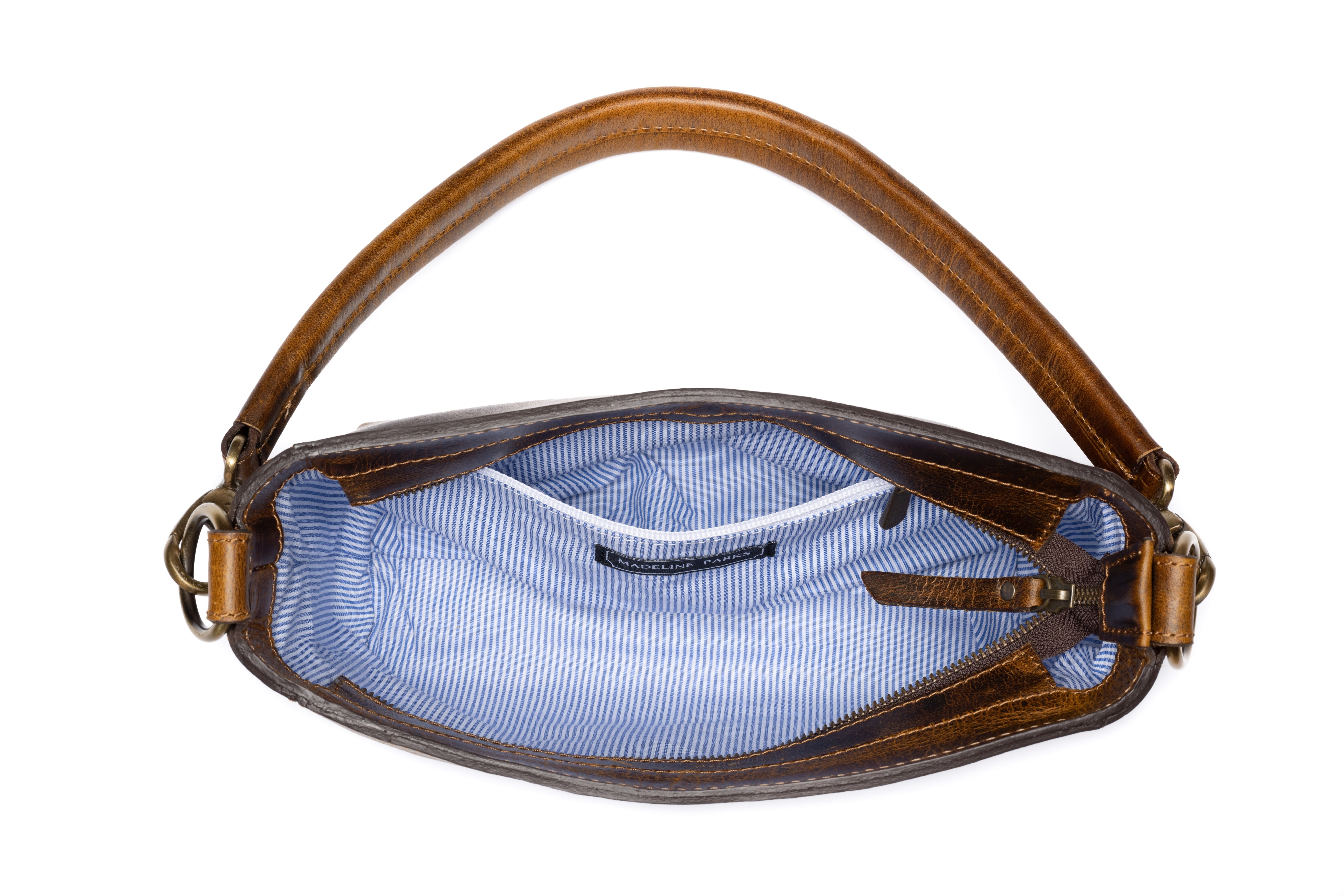 Top view showing inside a  Stylish leather purse with blue and white fabric lining.